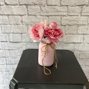Pink jar with flowers